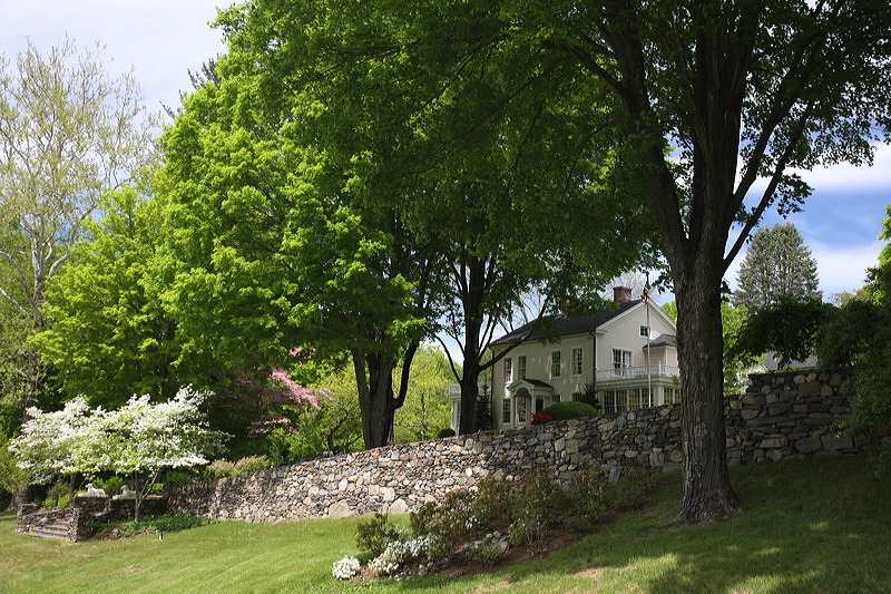 Side angle shot of exterior of the painted house.