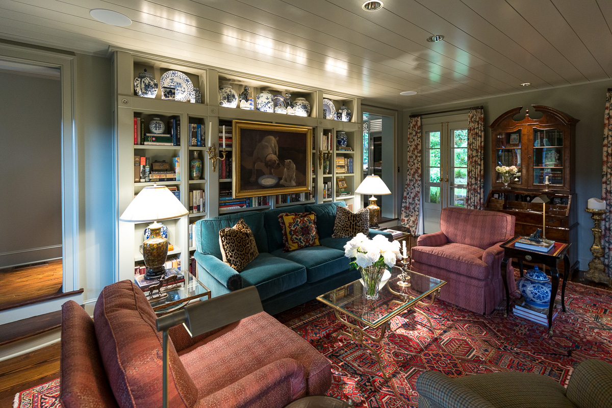 Living room painted walls around furniture and wall decorations.