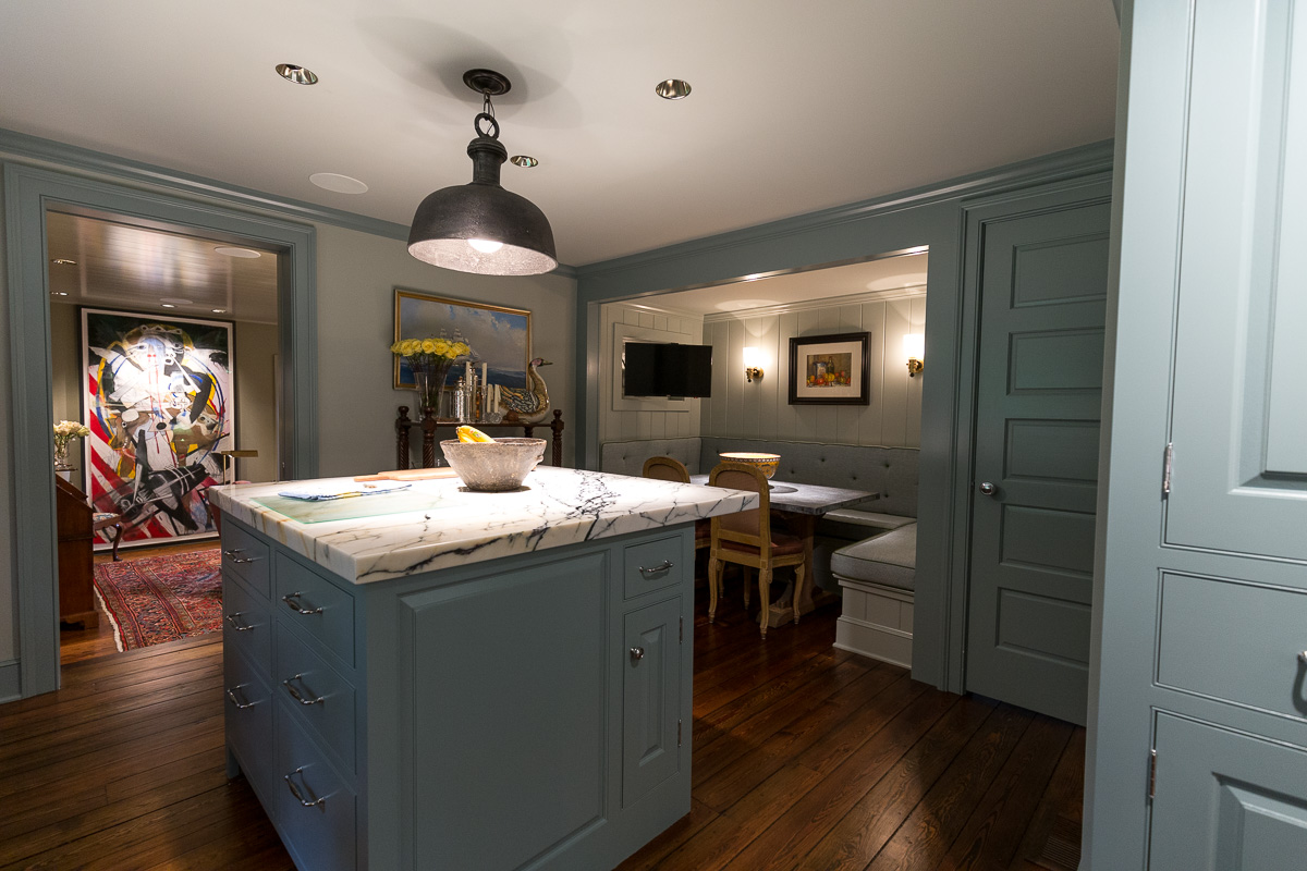 Painted kitchen island, with dining room walls and closet doors.