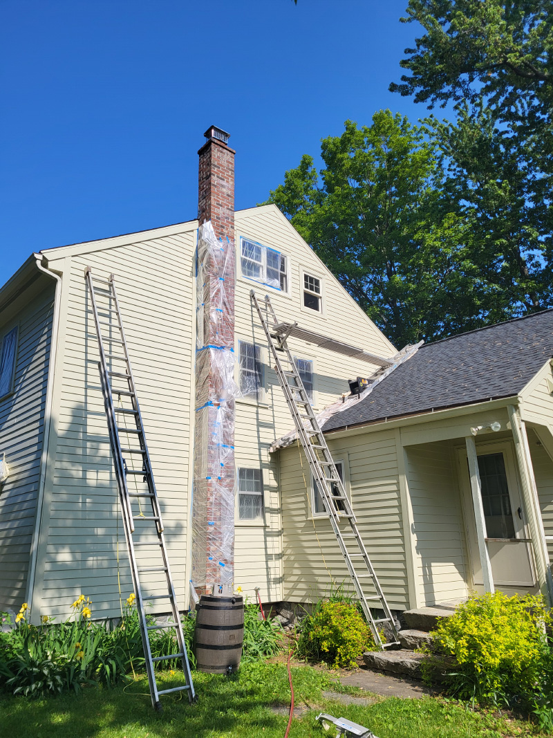 Exterior painting of a house.